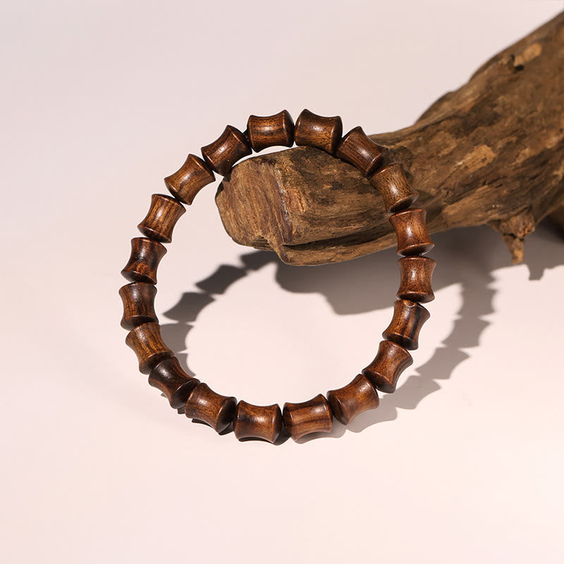 Bracelet spirituel en bois de rose avec le symbole Fu | Chaleur et chance