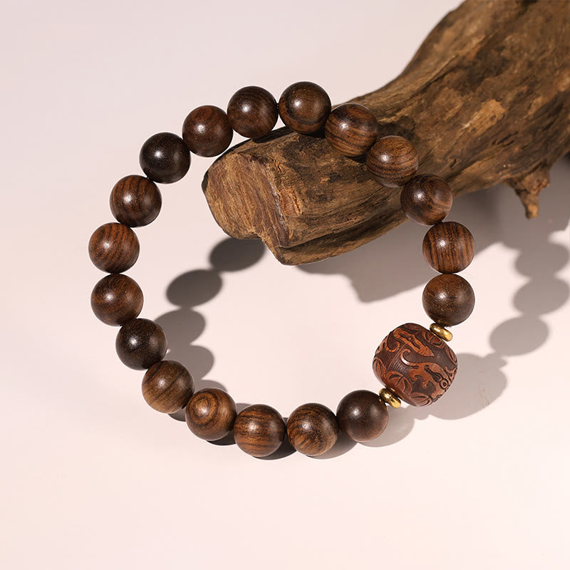Bracelet spirituel en bois de rose avec le symbole Fu | Chaleur et chance