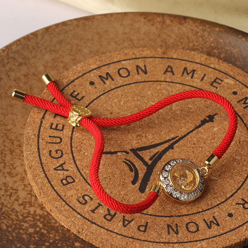 Bracelet de foi en fil rouge avec moulin à vent rotatif en cuivre et laiton