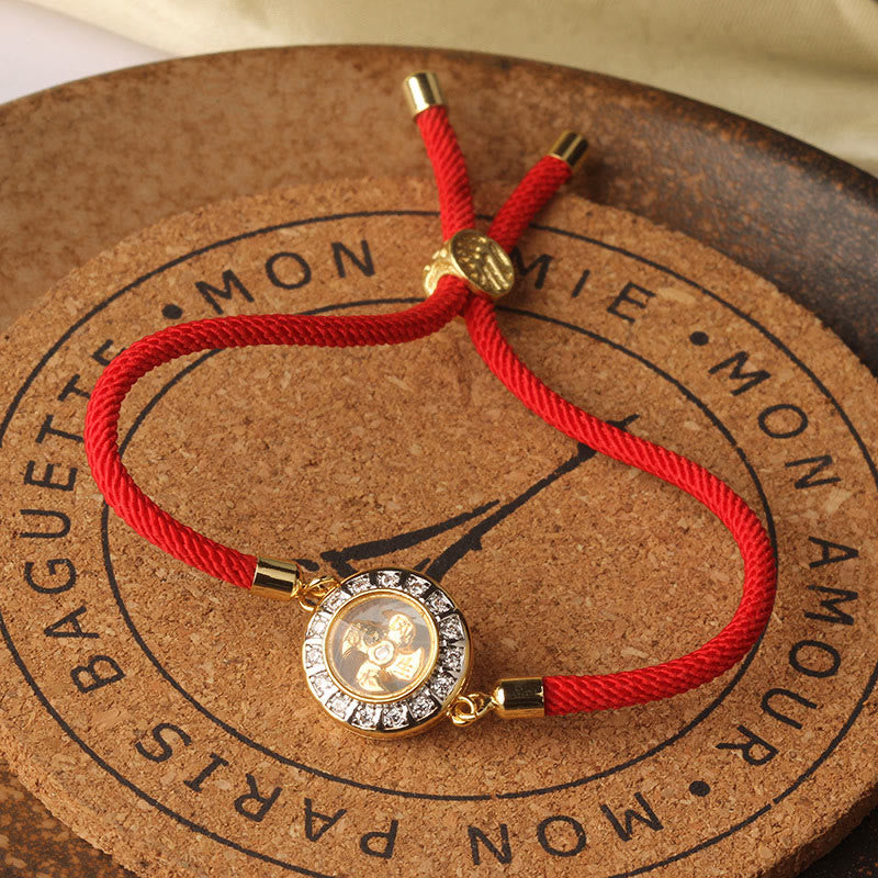 Bracelet de foi en fil rouge avec moulin à vent rotatif en cuivre et laiton