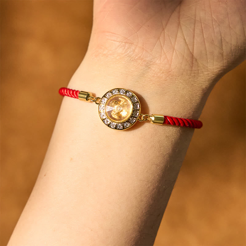 Bracelet de foi en fil rouge avec moulin à vent rotatif en cuivre et laiton