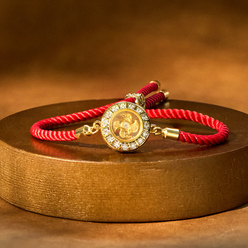 Bracelet de foi en fil rouge avec moulin à vent rotatif en cuivre et laiton