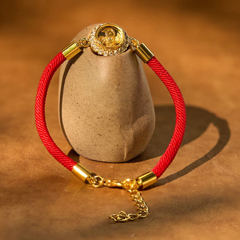 Bracelet Feng Shui en cuivre avec moulin à vent rotatif et fil rouge pour la protection