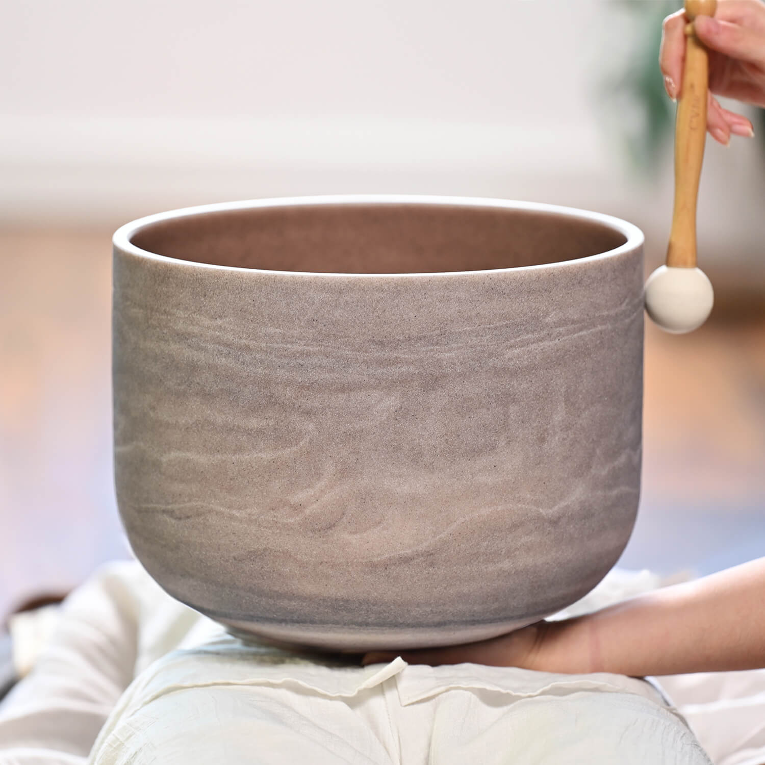 Gray ceramic singing bowl with textured surface from Ruby Gemstone Quartz for healing