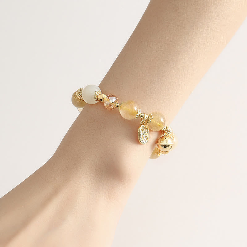 Bracelet spirituel en quartz rutile et pierre de lune pour le courage et la richesse