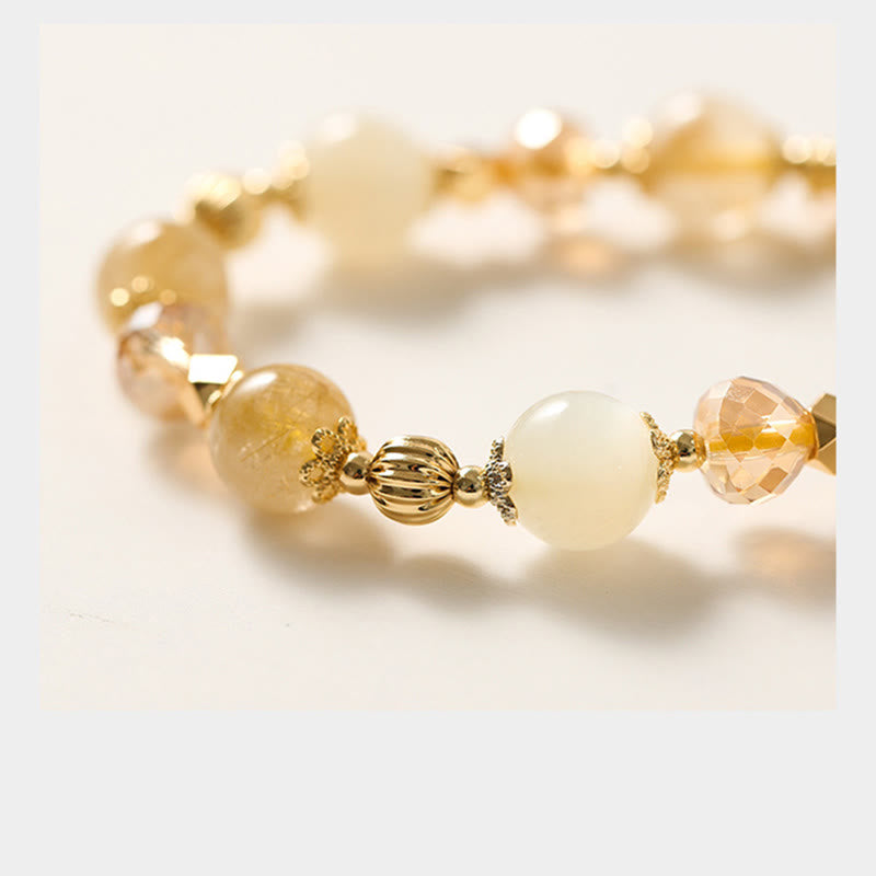 Bracelet spirituel en quartz rutile et pierre de lune pour le courage et la richesse