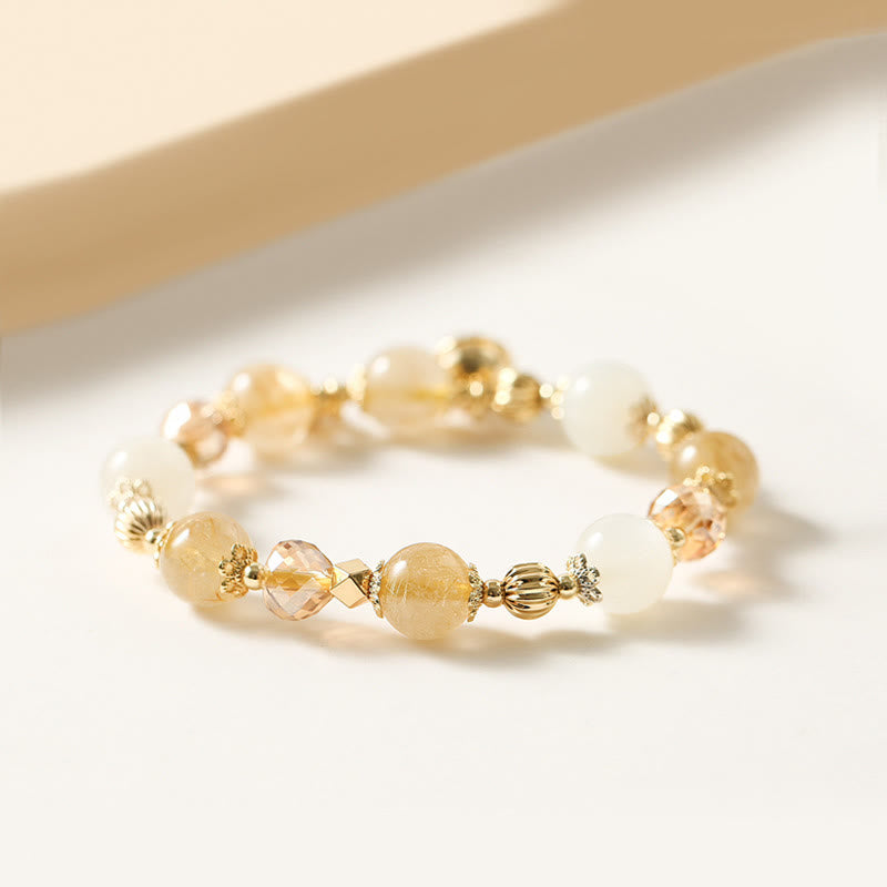 Bracelet spirituel en quartz rutile et pierre de lune pour le courage et la richesse