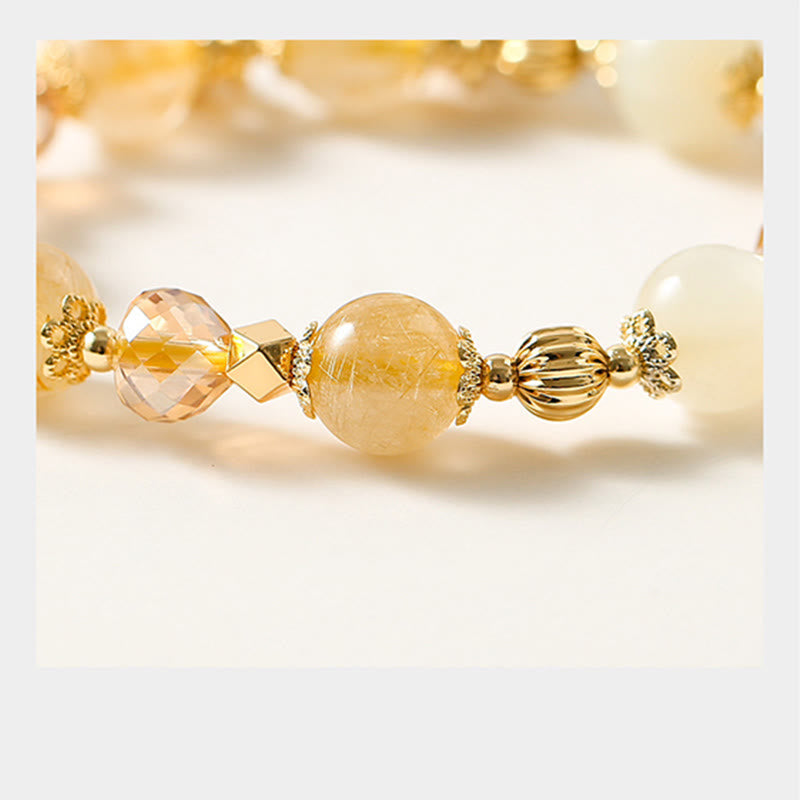 Bracelet spirituel en quartz rutile et pierre de lune pour le courage et la richesse