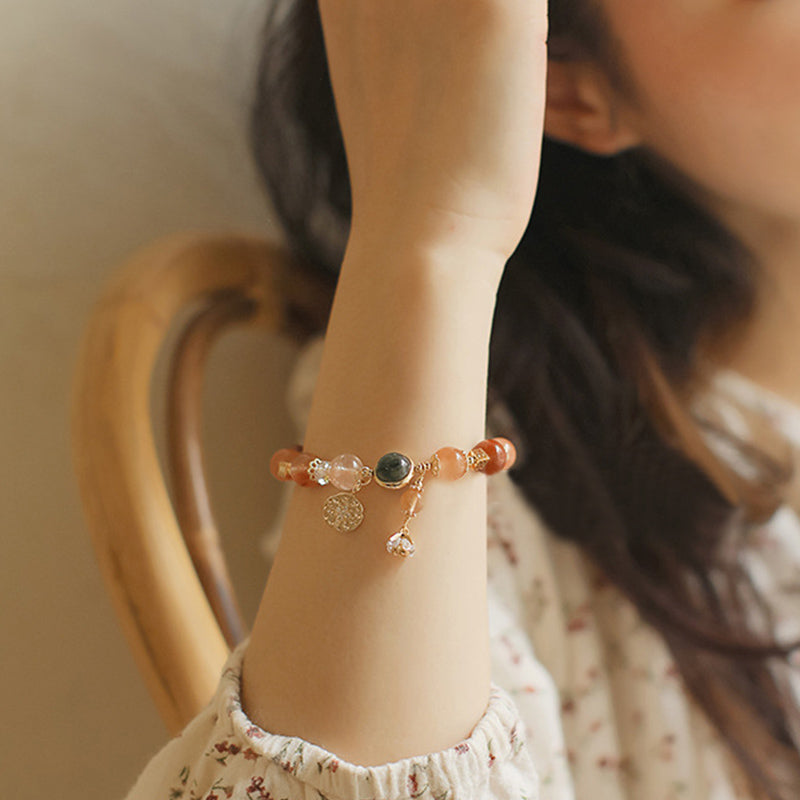 Bracelet de richesse en quartz rutile | Motif étoile à huit branches
