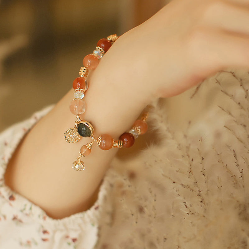 Bracelet de richesse en quartz rutile | Motif étoile à huit branches