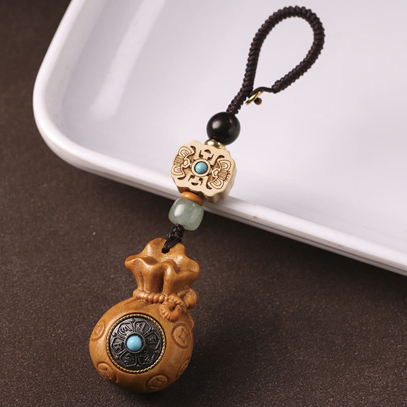 Porte-clés et suspension de téléphone en bois de santal Om Mani Padme Hum
