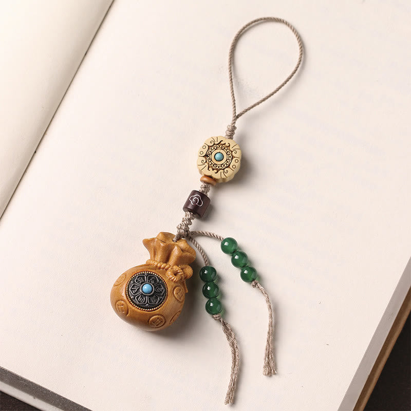 Porte-clés et suspension de téléphone en bois de santal Om Mani Padme Hum