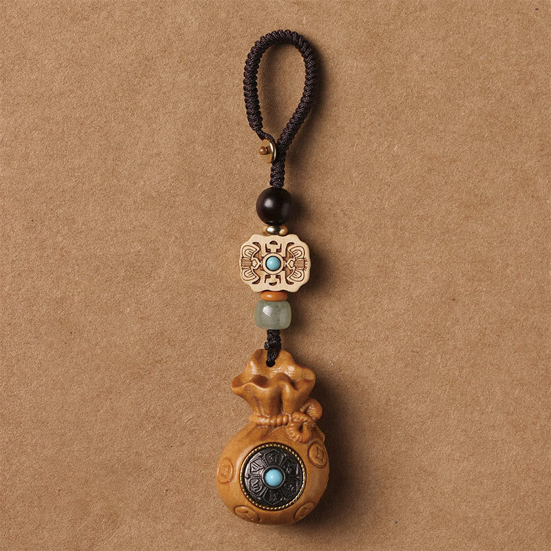 Porte-clés et suspension de téléphone en bois de santal Om Mani Padme Hum