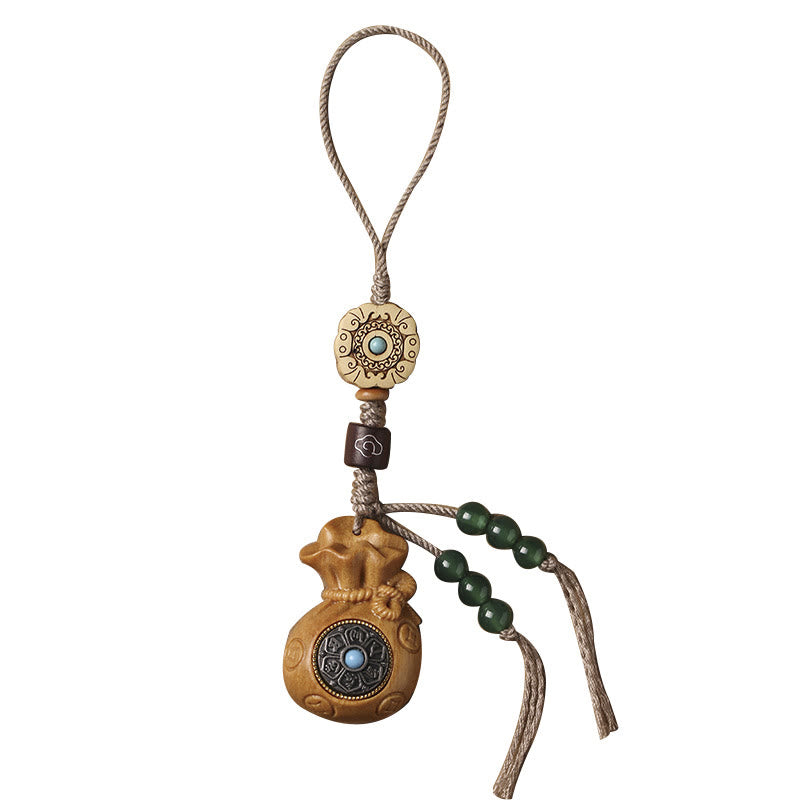 Porte-clés et suspension de téléphone en bois de santal Om Mani Padme Hum