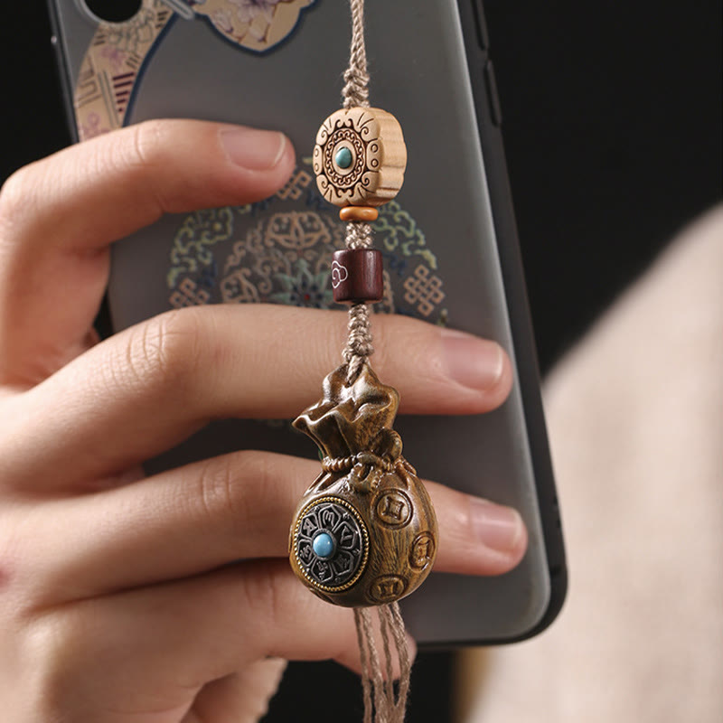 Porte-clés et suspension de téléphone en bois de santal Om Mani Padme Hum
