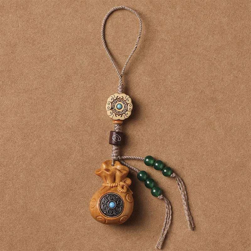 Porte-clés et suspension de téléphone en bois de santal Om Mani Padme Hum