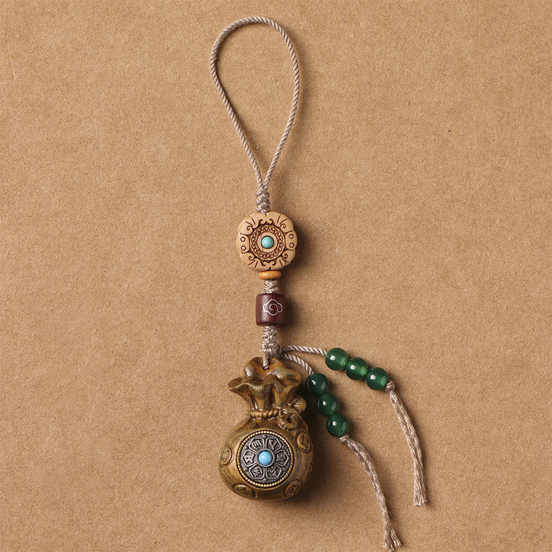 Porte-clés et suspension de téléphone en bois de santal Om Mani Padme Hum