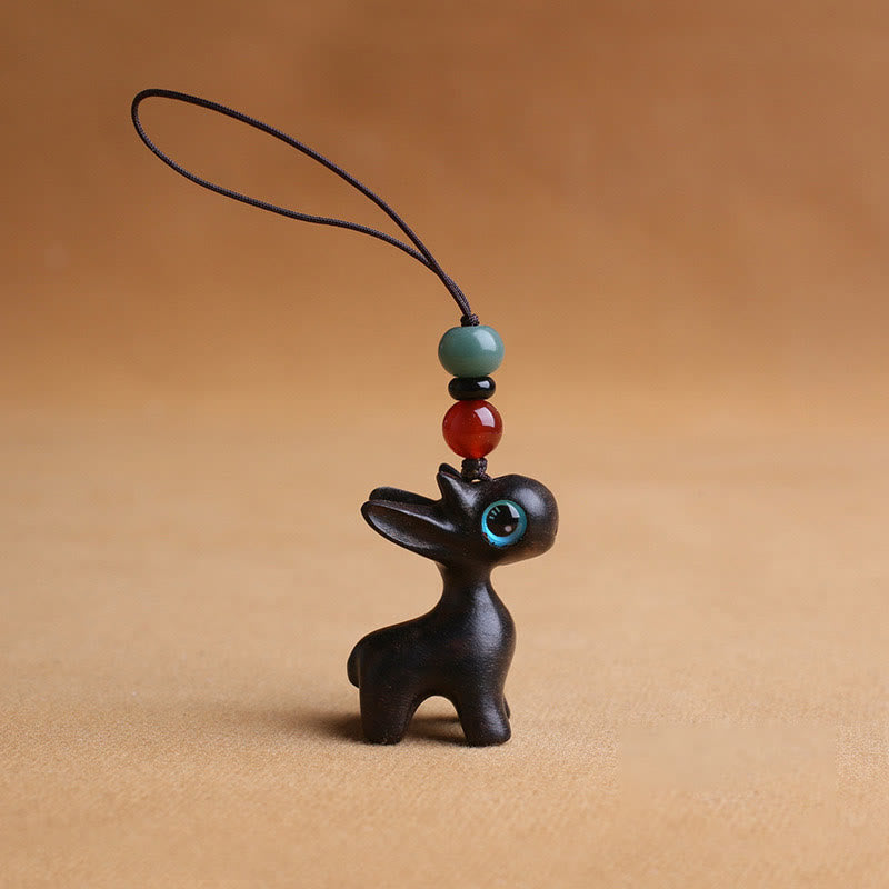 Porte-clés mini-protection contre les cerfs en bois de santal 35 mm