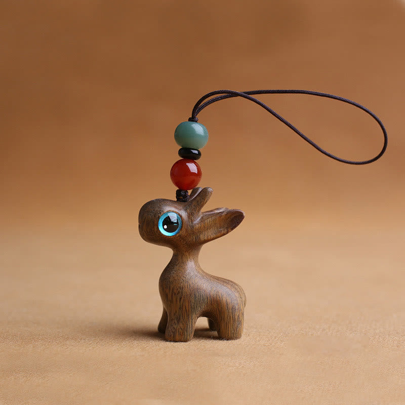 Porte-clés mini-protection contre les cerfs en bois de santal 35 mm