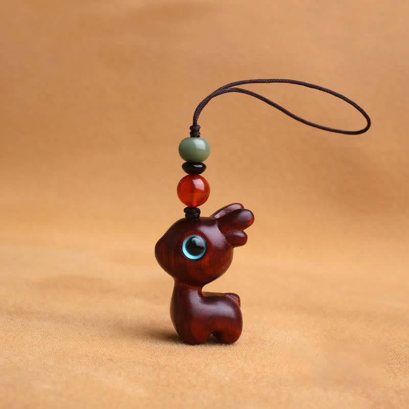Porte-clés mini-protection contre les cerfs en bois de santal 35 mm