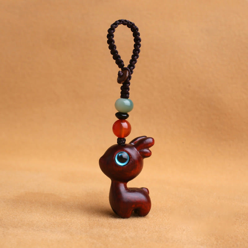 Porte-clés mini-protection contre les cerfs en bois de santal 35 mm