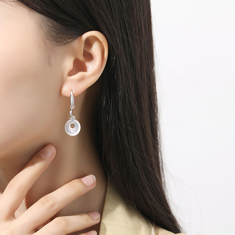 Boucles d'oreilles en argent et calcédoine avec boucle de paix