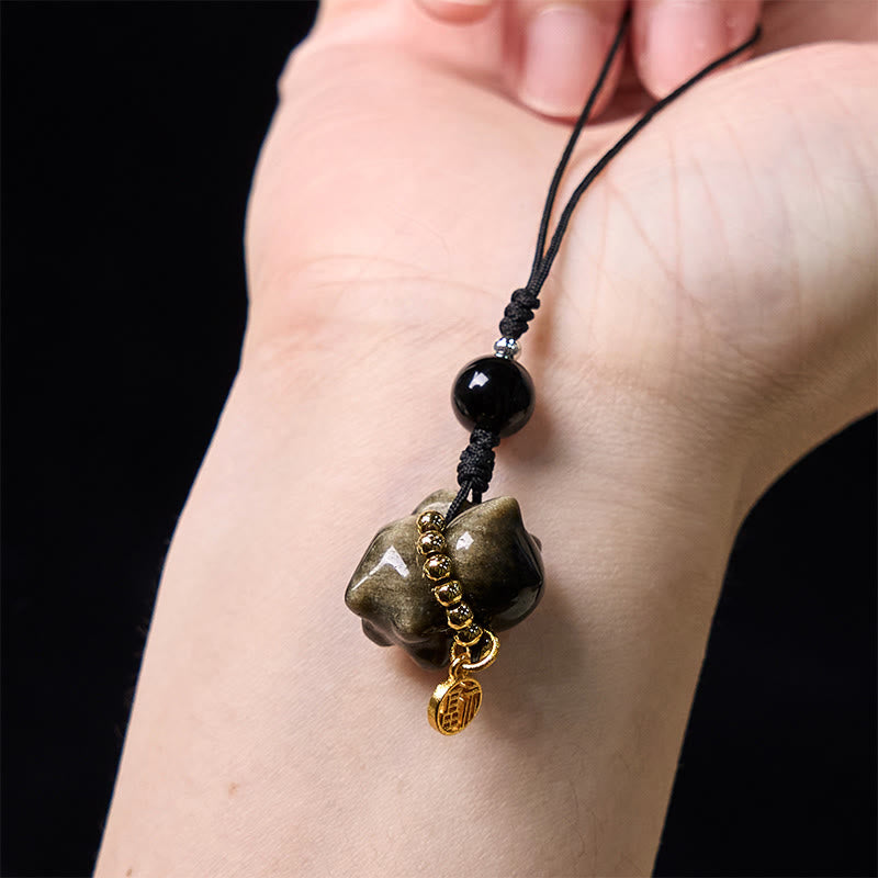 Porte-clés de protection en obsidienne argentée avec le personnage Fu