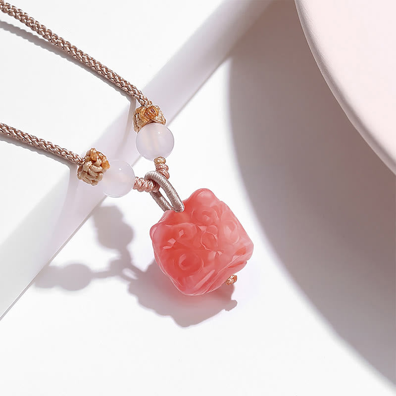 Collier pendentif de protection en agate rouge et obsidienne argentée