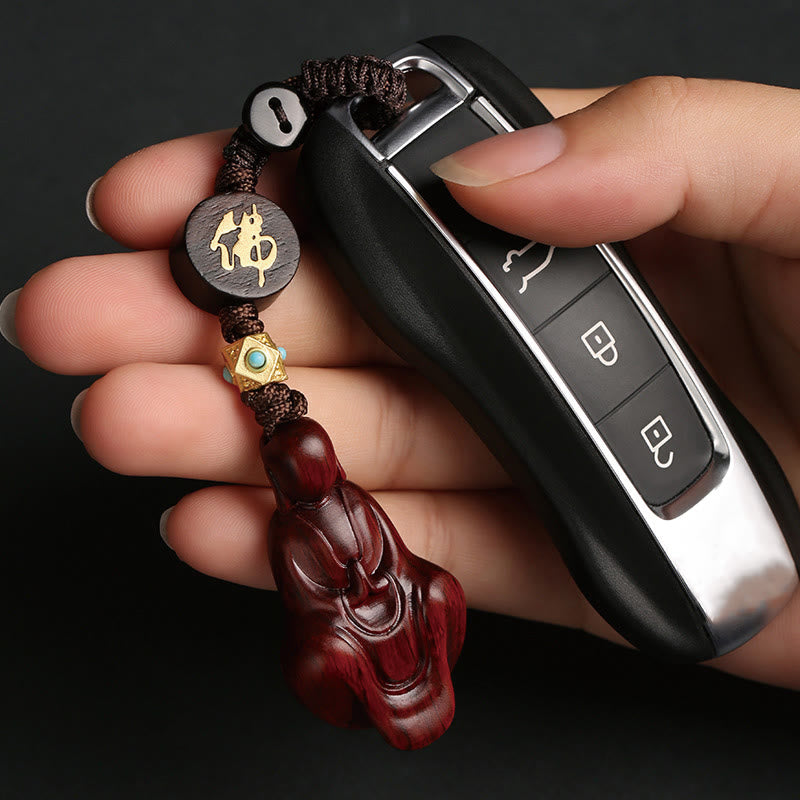 Porte-clés de protection Bouddha en bois de santal rouge à petites feuilles