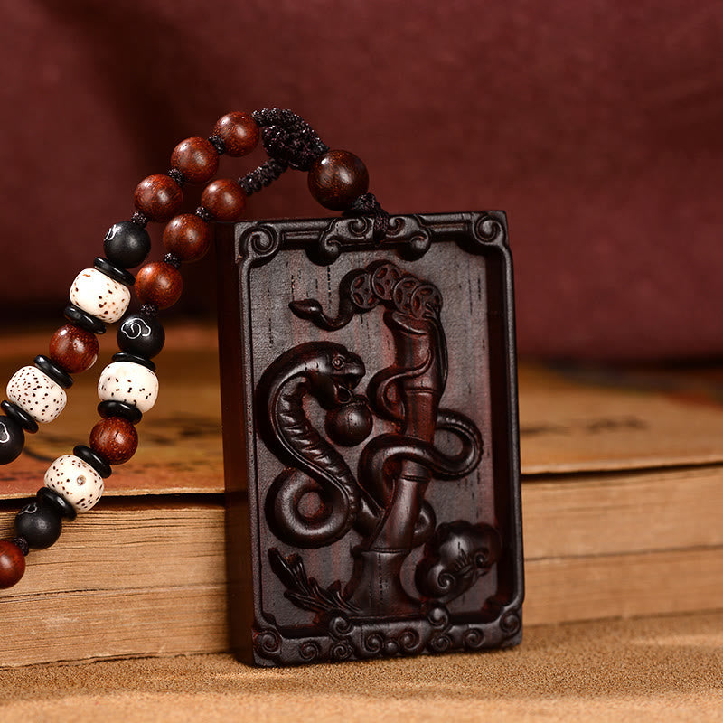 Collier du zodiaque chinois en bois de santal rouge à petites feuilles pour le calme