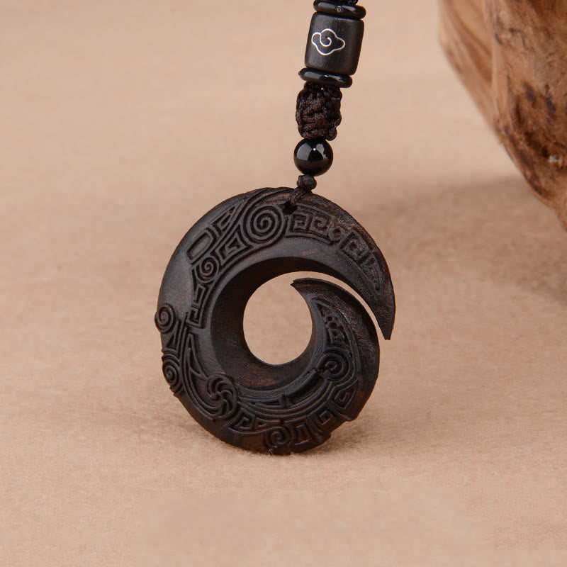 Collier de protection spirituelle en bois d'ébène et bois de santal rouge à petites feuilles