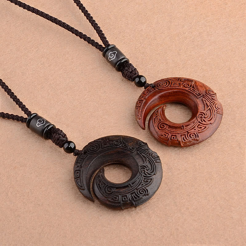 Collier de protection spirituelle en bois d'ébène et bois de santal rouge à petites feuilles