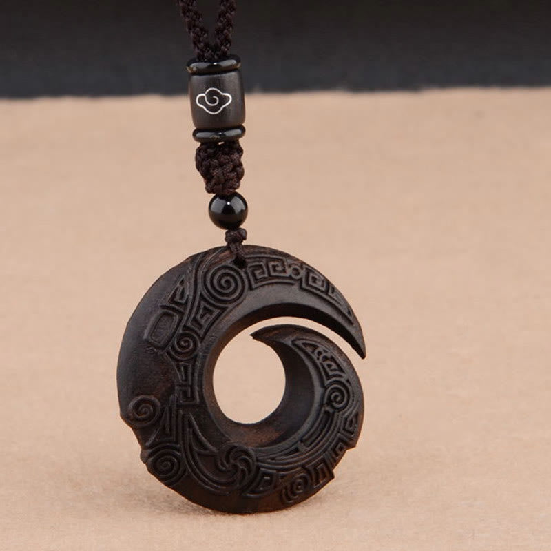 Collier de protection spirituelle en bois d'ébène et bois de santal rouge à petites feuilles
