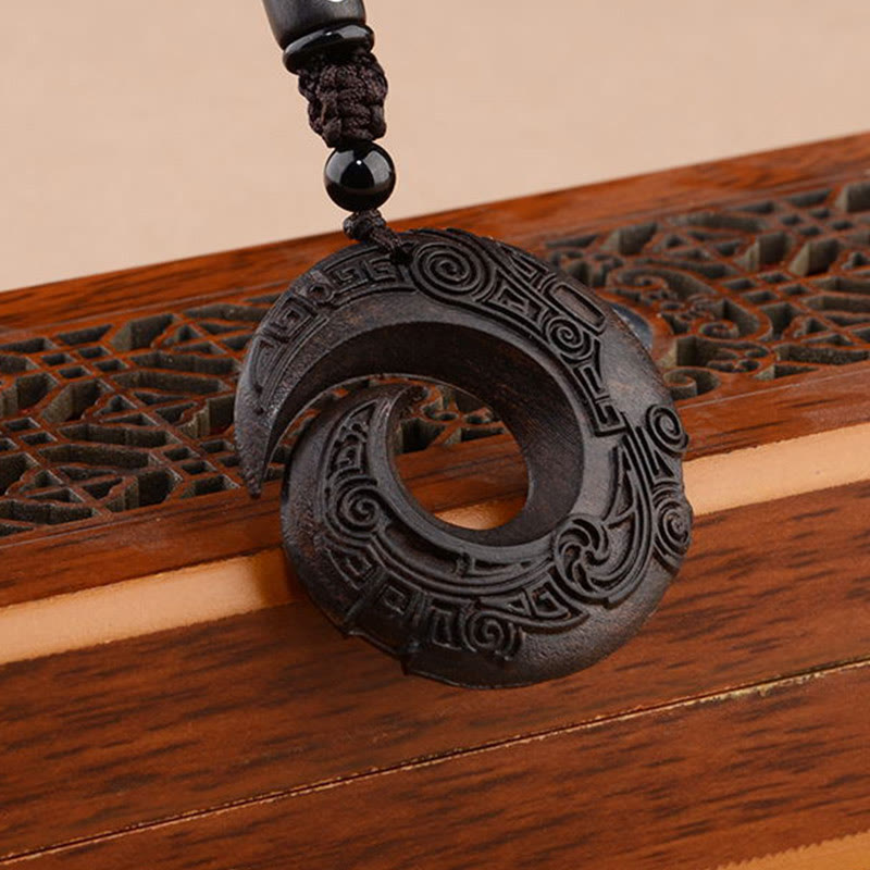 Collier de protection spirituelle en bois d'ébène et bois de santal rouge à petites feuilles