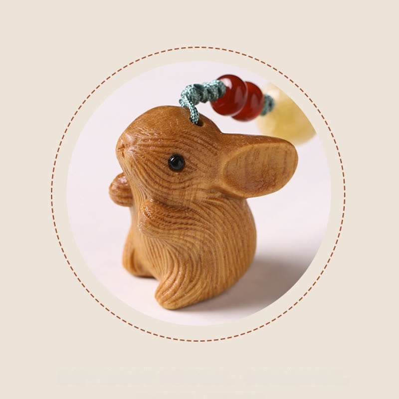 Porte-clés porte-bonheur lapin en bois de santal rouge à petites feuilles | Breloque de protection