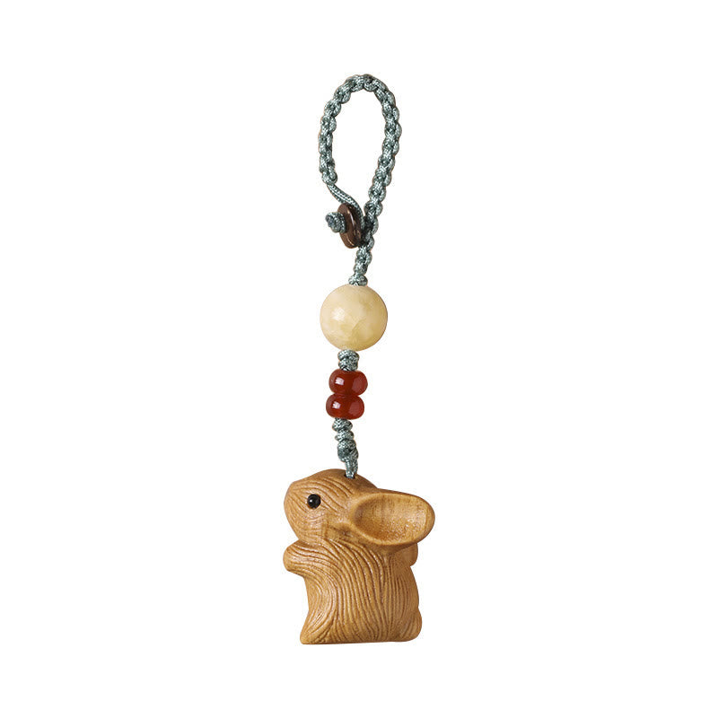 Porte-clés porte-bonheur lapin en bois de santal rouge à petites feuilles | Breloque de protection