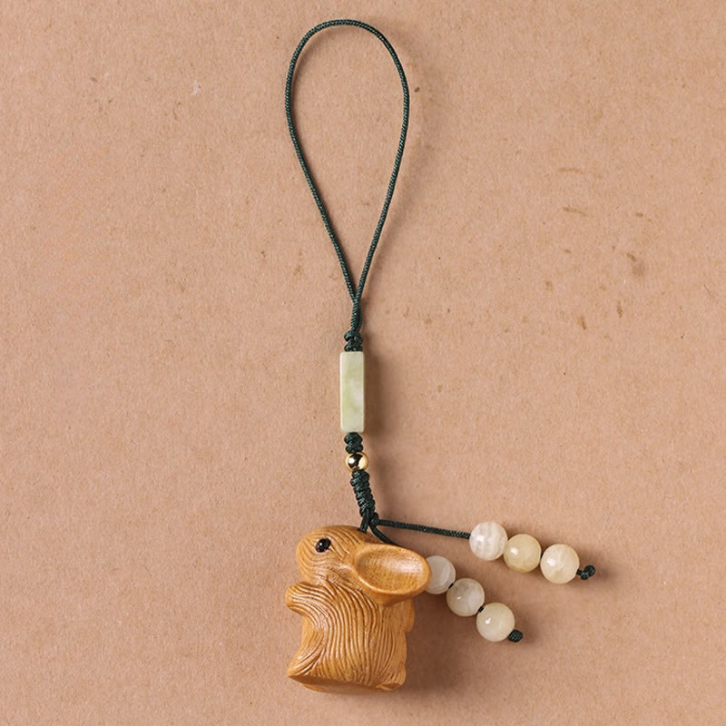 Porte-clés porte-bonheur lapin en bois de santal rouge à petites feuilles | Breloque de protection