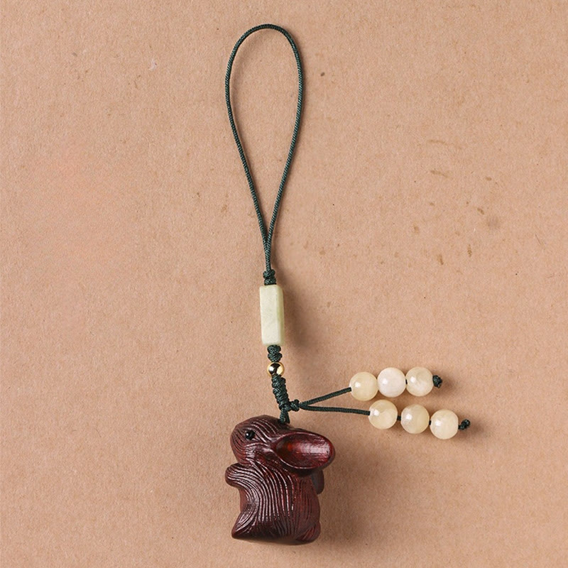 Porte-clés porte-bonheur lapin en bois de santal rouge à petites feuilles | Breloque de protection