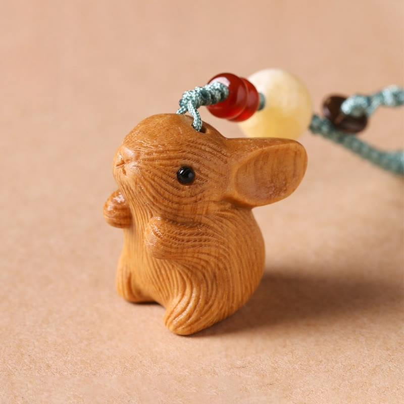 Porte-clés porte-bonheur lapin en bois de santal rouge à petites feuilles | Breloque de protection