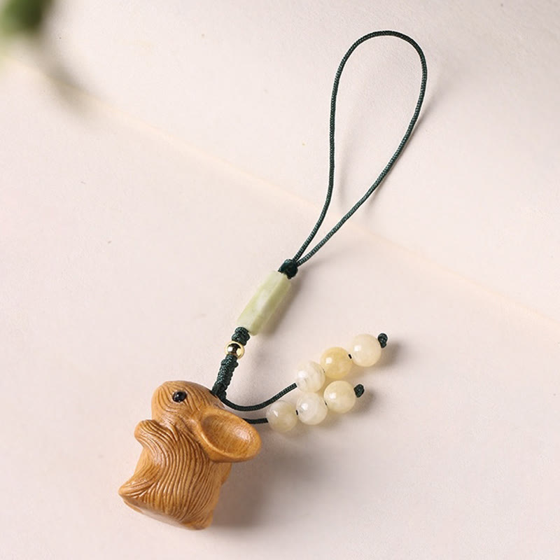 Porte-clés porte-bonheur lapin en bois de santal rouge à petites feuilles | Breloque de protection