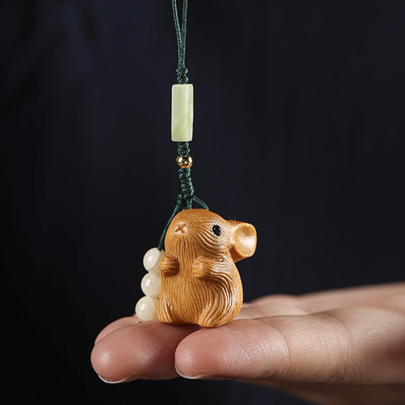 Porte-clés porte-bonheur lapin en bois de santal rouge à petites feuilles | Breloque de protection