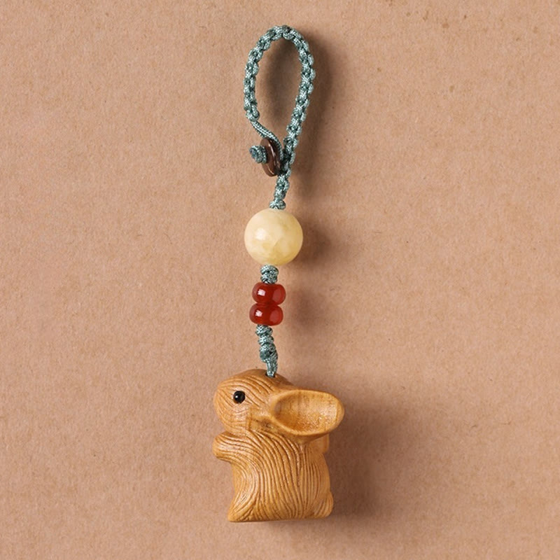 Porte-clés porte-bonheur lapin en bois de santal rouge à petites feuilles | Breloque de protection