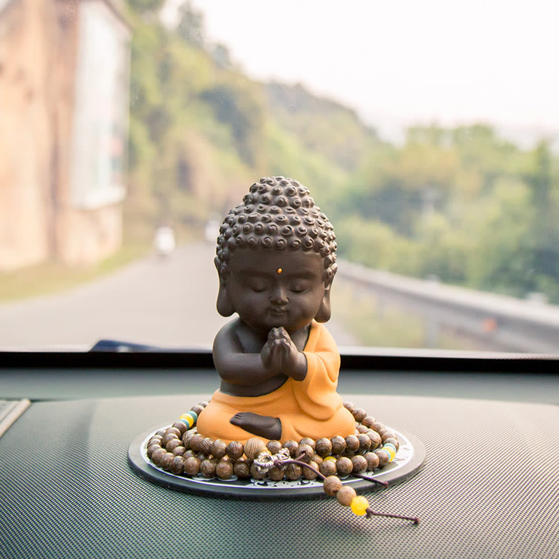 Petite statue de Bouddha en argile violette pour la sérénité de la maison