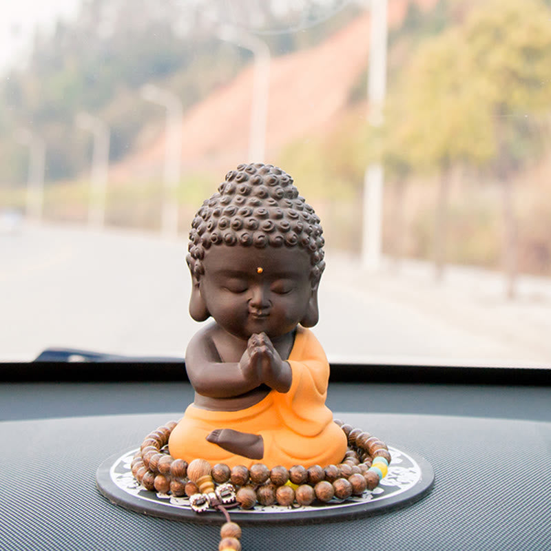 Petite statue de Bouddha en argile violette pour la sérénité de la maison