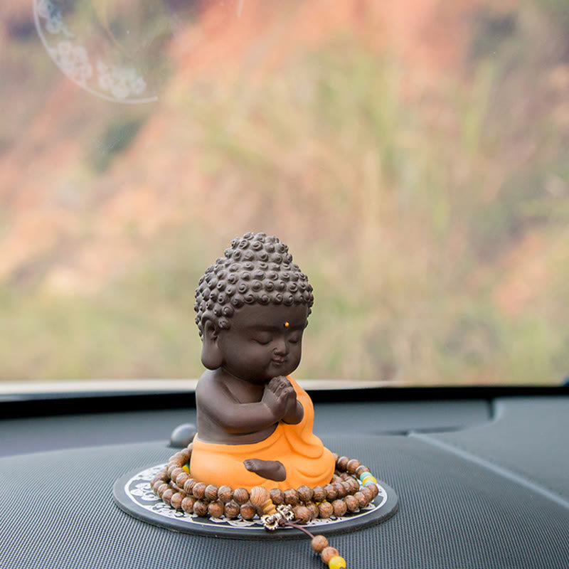 Petite statue de Bouddha en argile violette pour la sérénité de la maison