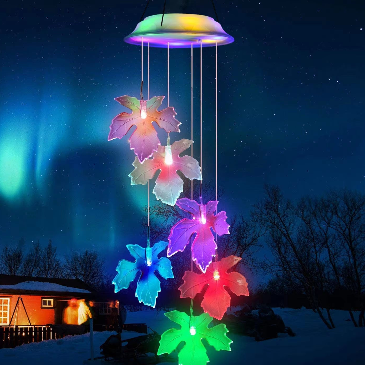 Color-changing LED wind chime with glowing maple leaf decorations for garden decor