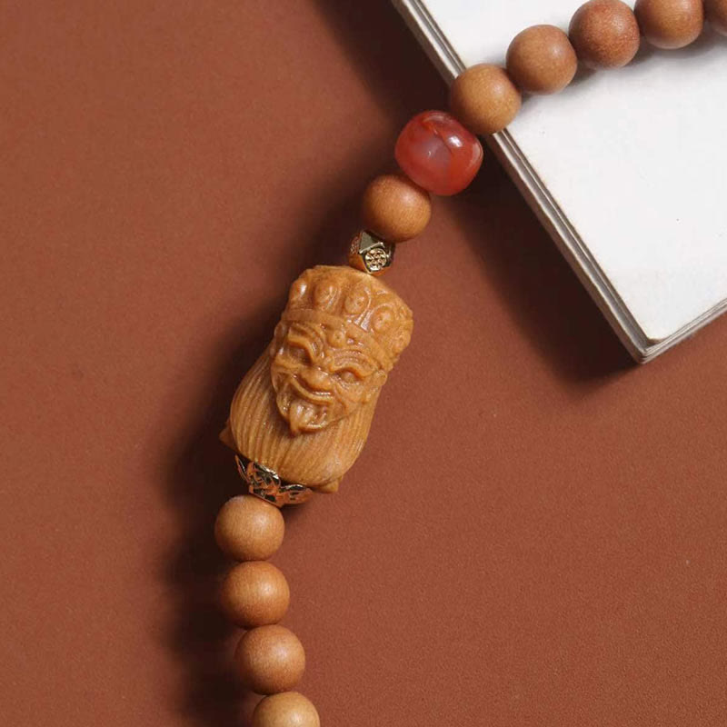 Bracelet en agate rouge du Sud et bois de santal pour la richesse et la protection