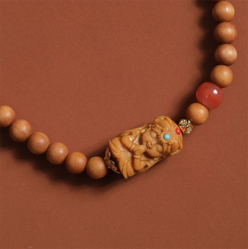 Bracelet en agate rouge du Sud et bois de santal pour la richesse et la protection