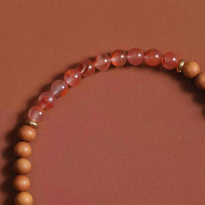 Bracelet en agate rouge du Sud et bois de santal pour la richesse et la protection