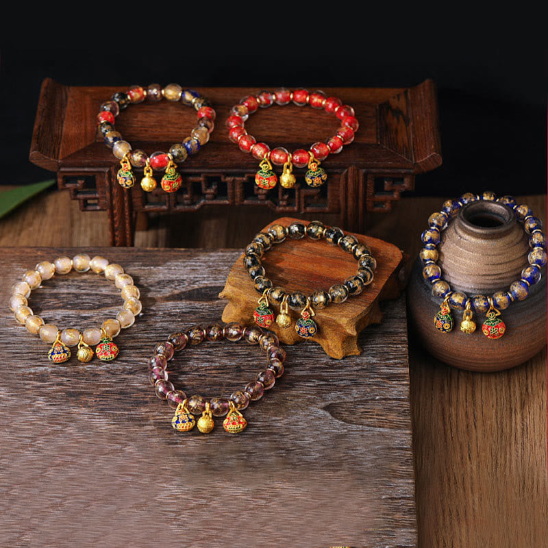 Bracelet spirituel avec bête avaleuse d'or et perles Liuli